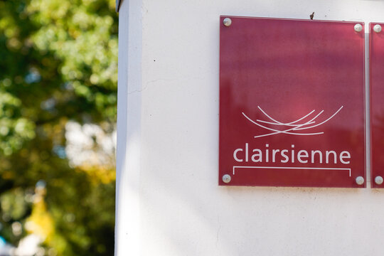 clairsienne text sign and logo brand office sell apartment housing residential office building retail