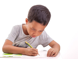 child drawing with pencils