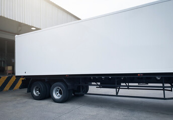 Obraz na płótnie Canvas Semi Trailer Trucks with Cargo Container Parked Loading at Dock Warehouse. Shipment. Packaging Boxes Supply Chain. Distribution Warehouse Shipping . Lorry. Cargo Freight Truck Transport Logistics.