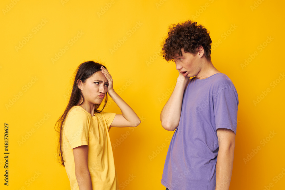 Wall mural young boy and girl friendship posing fun studio isolated background unaltered