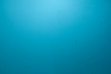 Blue concrete wall picture. Interesting concrete wall texture. Background for product design and placement.