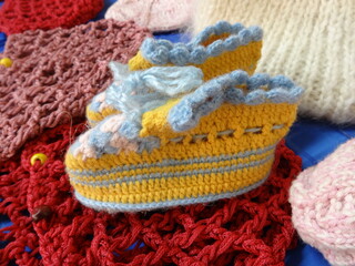 Fototapeta na wymiar Handmade Knitted Slippers