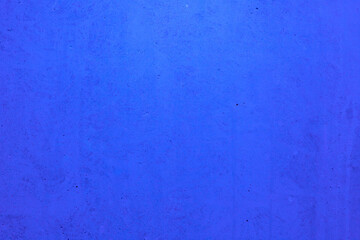 Blue concrete wall picture. Interesting concrete wall texture. Background for product design and placement.