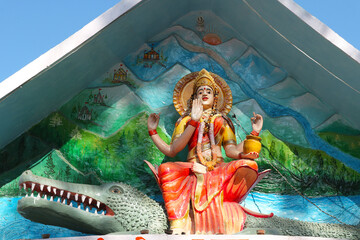 Sculpture of the goddess Ganges sitting on a crocodile. Hindu temple in Rishikesh, India.