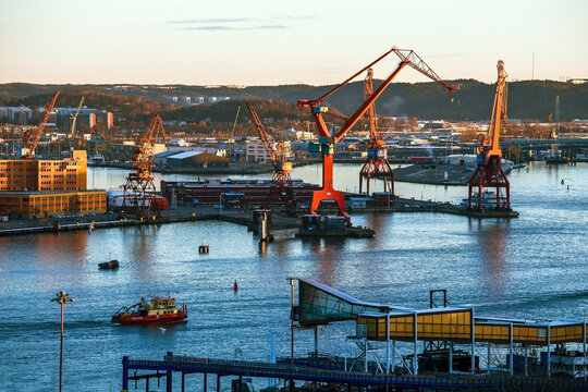 Goteborg industrial harbor port crane at sunset, Gothenburg, Sweden