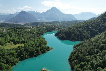 Turquoise reservoir in the mountains