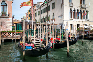 Fototapeta na wymiar Gondolas station Venice lagoon morning view Italy.