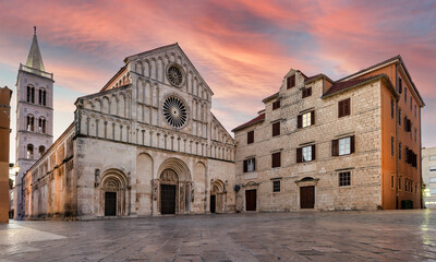 panoramic view of the facade of the Cathedral of St. Anastasia at sunrise in Zadar, Croatia.