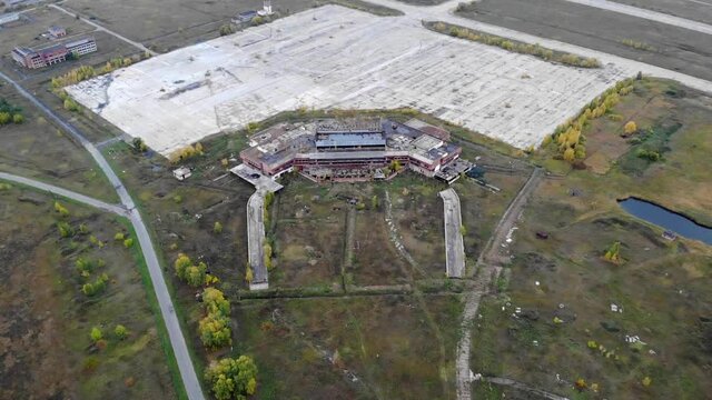 Aerial view on old abandoned airport and runaway
