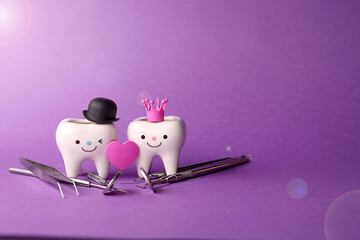 the medicine. concept.stomatology.tooth figurines boy and girl. dentist tools. Valentine's Day. love.dentist