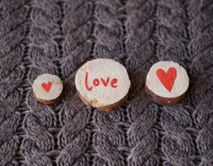 words of love and heart on wooden saw cuts