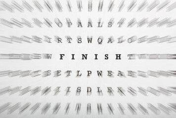 Fototapeta premium Word Finish in crossword letters with motion focus effect