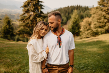Obraz premium Young lovers dreaming with their eyes closed to their deep love. Couple model, concept photo shoot