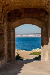Fototapeta na wymiar West gate of the walled enclosure of the old island of Tabarca, in the Spanish Mediterranean, in front of Santa Pola, Alicante