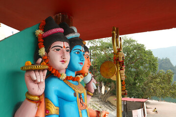 Obraz premium Brahma, Vishnu and Shiva in one form. Statue of an Indian god.