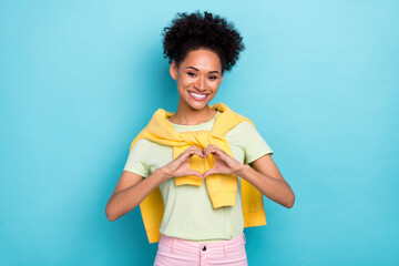 Photo of youth african lady show fingers heart symbol cupid romantic dream pullover on shoulders isolated over blue color background