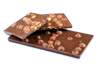 Tile with pieces of milk chocolate with nuts