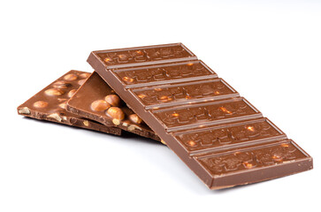 Milk chocolate with hazelnuts on a white background