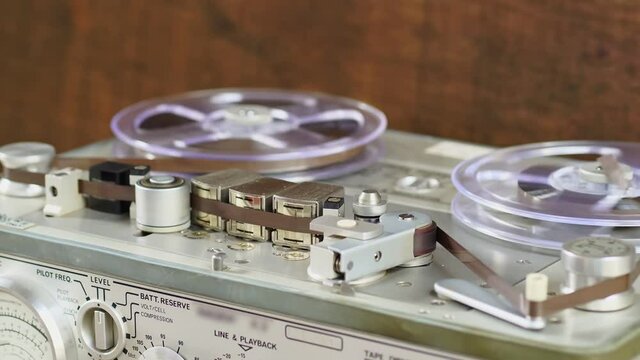 Old vintage reel-to-reel player. Tape recorder with spools. Bobbin tape recorder.	