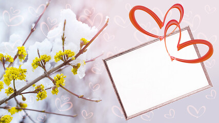 Text frame, two hearts on a defocused background of flowering branches and snow, bokeh in the shape of hearts