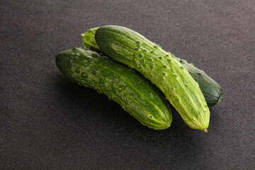 Fersh juicy green cucumbers heap