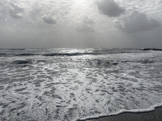 Gray and silver seascape, vivid sea horizon with silver cloudy sky 