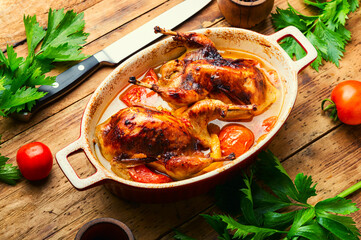 Quail roasted in tomatoes