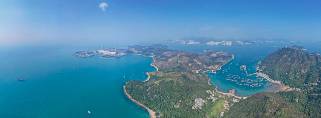 Amazing aerial view of the Lamma Power Station, Hong Kong and the mountain landscape nearby