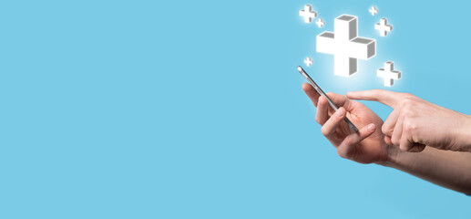 Hand hold 3D plus icon, man hold in hand offer positive thing such as profit, benefits, development, CSR represented by plus sign.The hand shows the plus sign