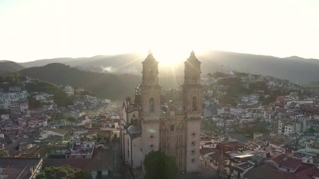 Church of Santa Prisca de Taxco, Mexico, Cinematic Aerial View of Landmark and Cityscape on Sunny Morning - Drone Shot