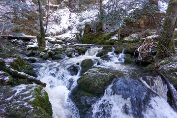 famous ravenna gorge, ravenna waterfall and wild river in the black forest in winter in breitnau...