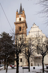 Fototapeta na wymiar Romania, Evangelical Church Tower in Bistrita ,January 2022