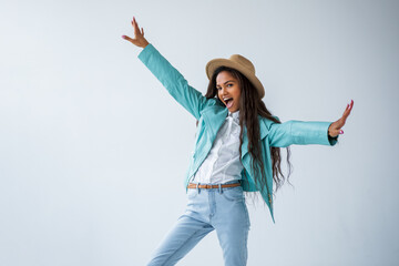 happy portrait of a black woman in hat