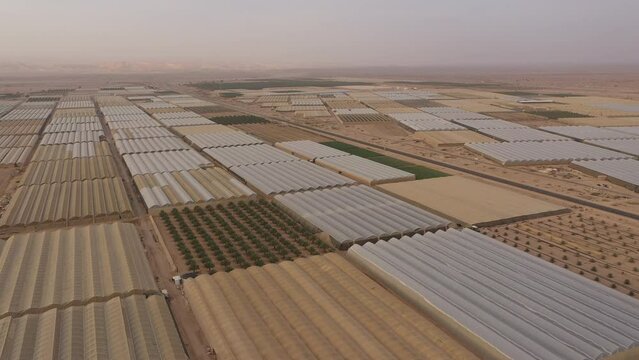 Israel agriculture and economy, aerial view of greenhouses on site of collective farming community ('moshav') in South Israel

