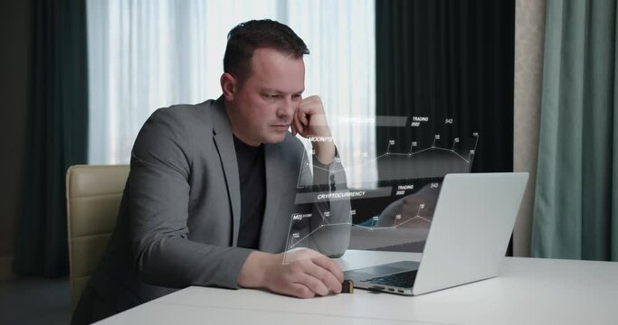 Holographic screen. Male trader on the stock exchange, analyzes charts of falling and rising quotes