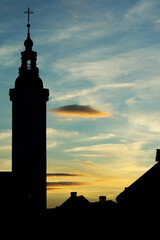 Silhouette of catholic church on evening sky background