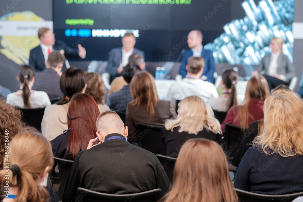 Canvas Prints Company of businesspeople listening to presentation at conference