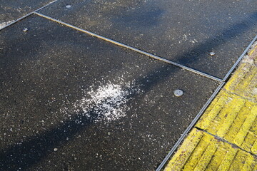 Snow-melting chemical on the street in Kasukabe, Saitama, Japan. January 7, 2022