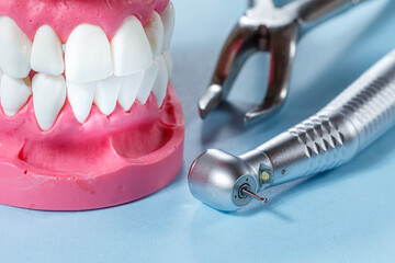 Dental instruments for teeth dental care on blue background