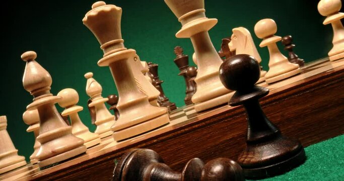 Wooden chess on white and black chessboard