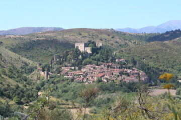 Fototapeta na wymiar Landscape view of the beautiful medieval village of Castelnou in the Pyrenees Orientales region of France.