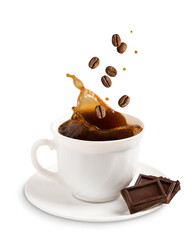 Splash of black coffee or espresso drink served in cup on plate with dark bitter choolate bars and levitating or falling roasted brown beans isolated on white backgorund. Breakfast food concept