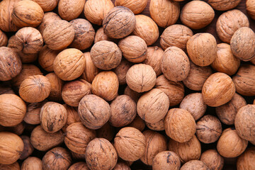 Background of walnuts close up. A full source of vegetable protein. Concept - healthy eating.