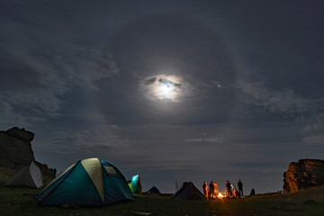 Lunar halo over a tourist camp