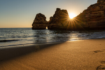 view of Camilo beach, at sunrise, in Lagos in the Algarve