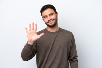 Young Brazilian man isolated on white background counting five with fingers