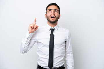 Business Brazilian man isolated on white background pointing up and surprised