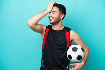 Young football player Brazilian man isolated on blue background has realized something and intending the solution