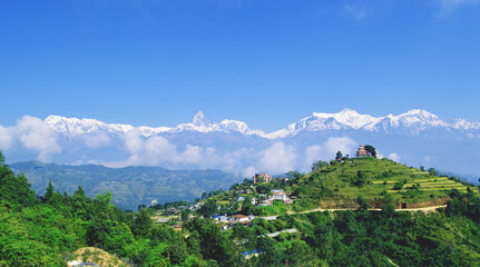 landscape with mountains and clouds: 
A beautiful view of mountain range of Annapurna and Fishtail...
