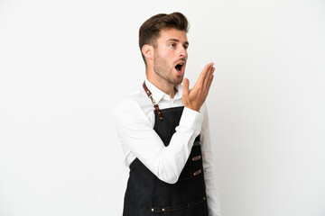 Restaurant caucasian waiter isolated on white background yawning and covering wide open mouth with...
